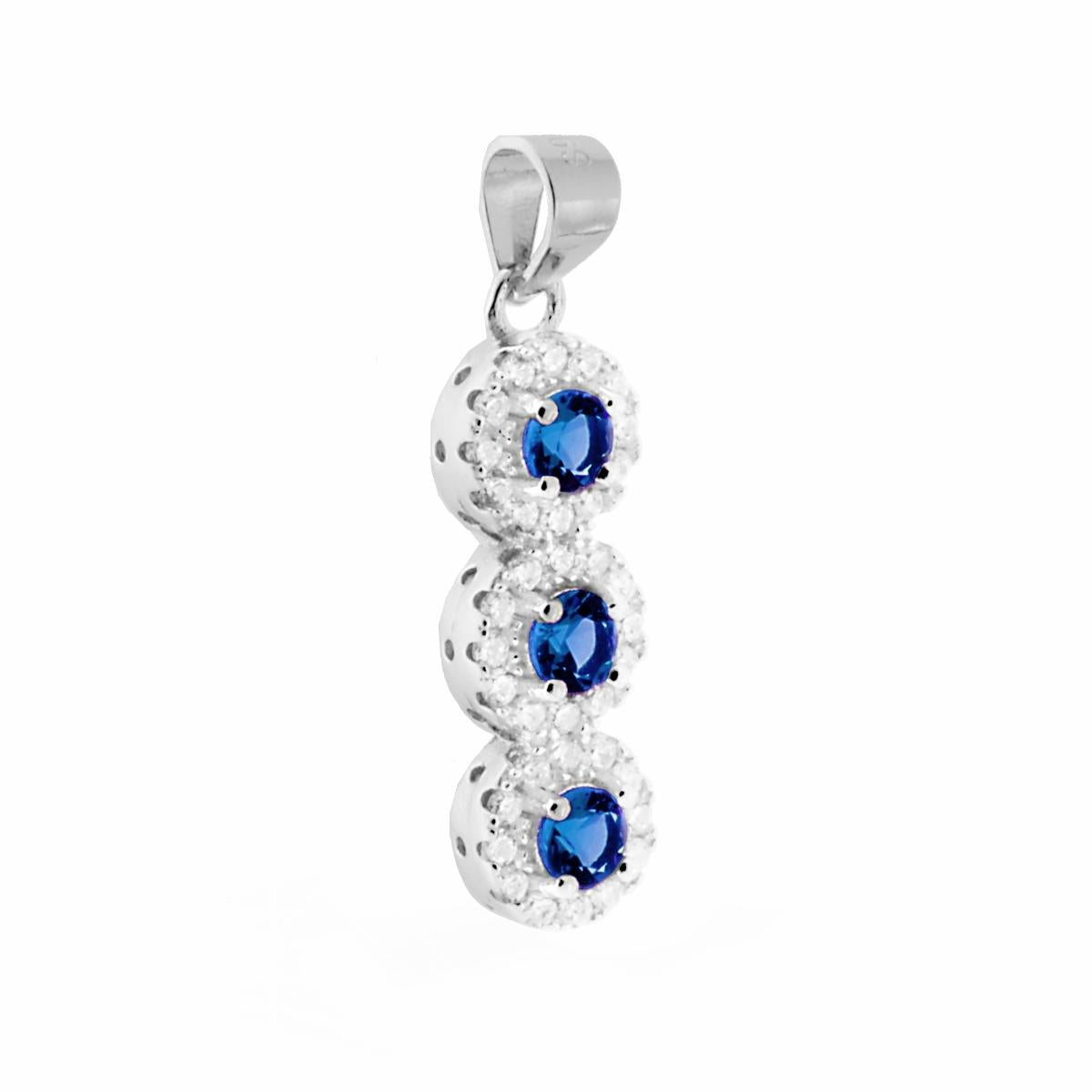 Ciondolo Trilogy Punto Luce Tondo con Zirconi Blu Zaffiro contornati da Zirconi Bianchi in ARGENTO 925 Galvanica Rodio